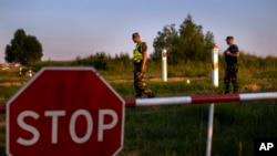 Lithuania border guards patrol the frontier with Belarus, near the village of Purvenai. (file photo)