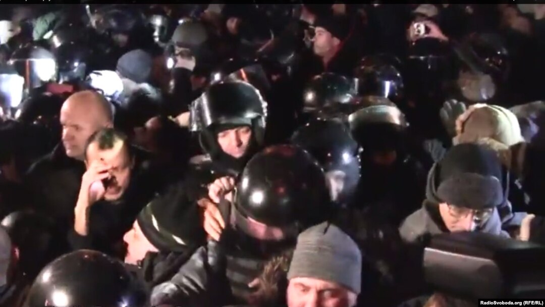 Violence erupted outside the Kyiv court after three men were sentenced to jail terms for allegedly plotting to blow up a Lenin statue in 2011.
