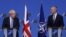 British Prime Minister Boris Johnson and NATO Secretary-General Jens Stoltenberg hold a joint news conference in Brussels on February 10. 