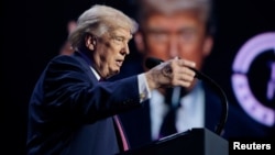 US President Donald Trump speaks at the Turning Point USA event in Phoenix, Arizona, on April 17.