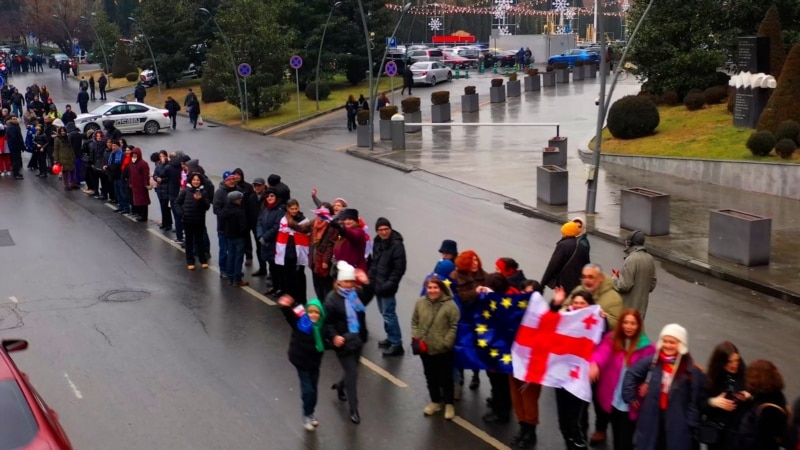 Georgian Anti-Government Protesters Form Human Chain