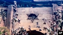 Сгоревшая синагога в Махачкале после нападения. 23 июня 2024 года