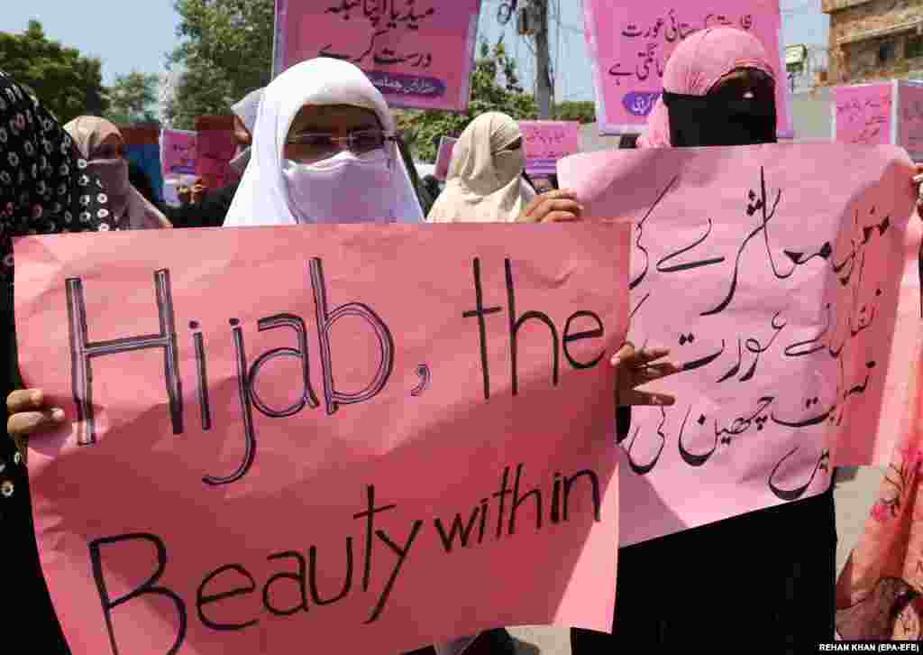 Supporters of the Islamic political party Jamat-e-Islami rally to create awareness of the hijab, or head scarf, in Karachi, Pakistan.