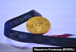 Золота нагорода чемпіона Олімпіади у Токіо Жана Беленюка