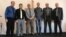 Seventy-one-year-old pastor Yury Korniyenko (seen here third from left with other congregation members) received a court summons and was subsequently charged with engaging in illegal missionary work.