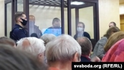 The three defendants appear in court in Hrodna on May 17.