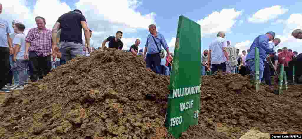 Bosnia-Herzegovina - A collective funeral for the 12 war crime victims killed in 1992 in Prijedor, northwestern Bosnia and Herzegovina, Kozarac, 20Jul2021