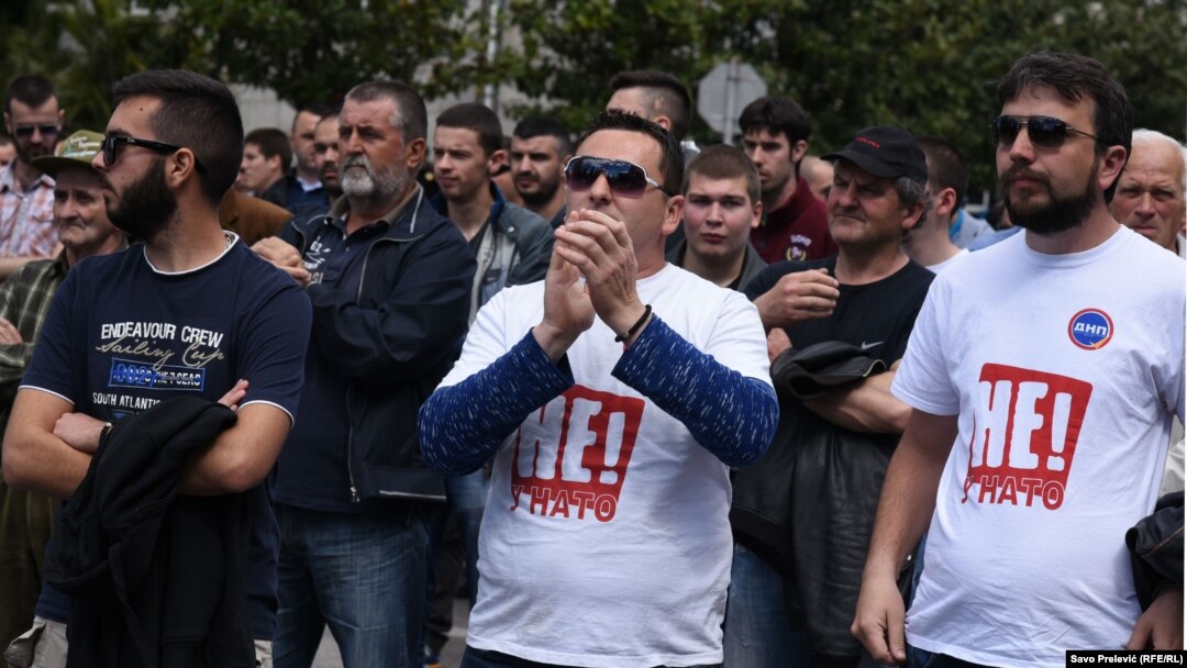 Dozens of anti-NATO activists protest in front of parliament in Podgorica on April 8.