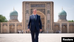 British Foreign Secretary David Cameron visits Samarkand, Uzbekistan, on April 23.