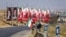 تصویری از فرماندهان و مقامات کشته‌شدهٔ، و رهبران پیشین و فعلی جمهوری اسلامی در مسیر یک راهپیمایی مذهبی