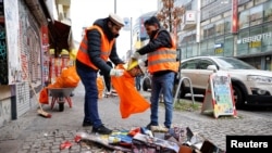 Curățenia de după revelion în cartierul berlinez Neukoeln.
