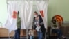 Women vote in the 2020 gubernatorial election of Russia's Leningrad region in 2020.