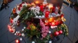 GERMANY - People place candles at central market square in Halle, Germany October 10, 2019, after two people were killed in a shooting