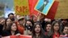 Activists of the Aurat (Woman) March shout slogans during a rally to mark International Women's Day in Islamabad on March 8.