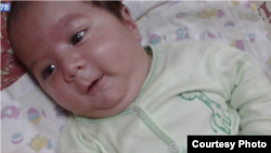 Умарали Назаров, таджикский младенец, скончавшийся в России. 19 октября 2015 года.
