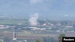Tym mbi fshatin Kfar Yuval në veri të Izraelit, pas një rakete të hedhur nga Libani, 14 janar 2024.