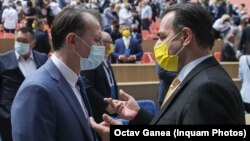 Lupta internă din PNL face ca numirile să fie blocate de premier pentru ca oamenii lui Ludovic Orban să nu ajungă în poziții-cheie. Ludovic Orban (dreapta) și Florin Cîțu (stânga), 2021