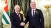 Владимир Путин и Бадра Гунба, архивная фотография
