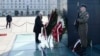 The head of the Polish Law and Justice party, Jaroslaw Kaczynski, lays a wreath at a monument to his late twin brother, former President Lech Kaczynski, on Pilsudski Square in Warsaw on April 10. 