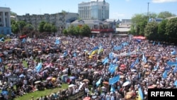 Crimean Tatars commemorate the 65th anniversary of the mass deportation in Simferopol on May 18.