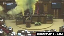 Armenia - Opposition deputies set off smoke flares during a parliament session in Yerevan, 11 April 2018.