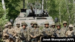 Militari polonezi și americani la manevrele „ Defender-Europe 20” de la Drawsko Pomorskie, 17 iunie 2020. 