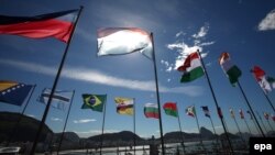Flags of participating countries fly outside a TEDx summit in Rio de Janeiro in June.