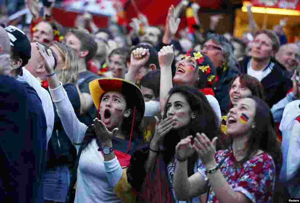 Brazil -- Fans of Germany react as they watch the 2014 World Cup final between Germany and Argentina in Brazil at a public screening of the match in Berlin July 13, 2014.