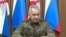 Russian Defence Minister Sergei Shoigu attends a meeting with officials of the Defence Ministry in an unknown location