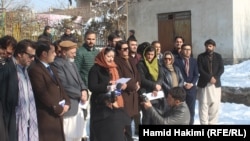 Afghan media representatives address a press conference in Kabul on February 4.