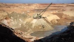 A view of an ilmenite open-pit mine in a canyon in the central region of Kirovohrad, Ukraine, in February. Reaching a deal to give US companies access to Ukraine's mineral resources has proved difficult, with clashes and acrimony highlighting the talks.