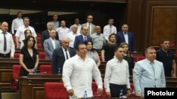 Armenia -- Gagik Tsarukian and other deputies from his Prosperous Armenia Party attend a parliament session in Yerevan, July 9, 2019.