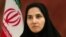 In a photo posted to an Iranian government website, Vice President Laya Joneydi is shown wearing a chador, which covers the entire body and only leaves the face exposed.