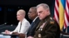 Secretary of Defense Lloyd Austin (center), Chairman of the Joint Chiefs General Mark Milley (right) and Assistant Secretary of Defense for International Security Affairs Celeste Wallander (left) attend during a virtual meeting of the Ukraine Defense Contact Group at the Pentagon in Washington on July 18.