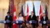 Secretary of State Mike Pompeo, second from right, with Defense Secretary Jim Mattis, right, and their Canadian counterparts Canadian Minister of Foreign Affairs Chrystia Freeland and Canadian Minister of Defense Harjit Sajjan, left, speaks to reporters d