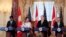 Secretary of State Mike Pompeo, second from right, with Defense Secretary Jim Mattis, right, and their Canadian counterparts Canadian Minister of Foreign Affairs Chrystia Freeland and Canadian Minister of Defense Harjit Sajjan, left, speaks to reporters d