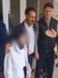 Azerbaijan - a girl is escorted out of her school in Jalilabad, Azerbaijan, during a dispute over a ban on hijabs in school - screen grab