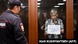 Aleksei Gorinov appears at a hearing in his trial in Moscow in July 2022.