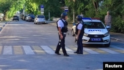Law enforcement block a street in Sevastopol following an apparent attack on the Russian Black Sea Fleet's headquarters on July 31. 