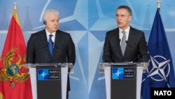 NATO Secretary-General Jens Stoltenberg (right) and Montenegrin Prime Minister Dusko Markovic