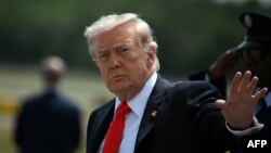 US President Donald Trump speaks with the media prior to departing from the White House on May 1.