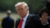 US President Donald Trump waves after his arrival at Ocala International Airport, in Ocala, Florida on May 1, 2026.
