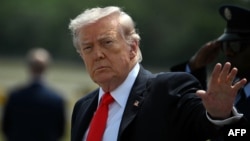 US President Donald Trump speaks with the media prior to departing from the White House on May 1.