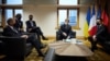 Президент України Володимир Зеленський (праворуч), президент Франції Еманюель Макрон (другий справа) та канцлер Німеччини Олаф Шольц (ліворуч) в кулуарах саміту «Східного партнерства». Бельгія, Брюссель, 15 грудня 2021 року 
