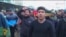 WATCH: Baghdad residents on February 25 carried the coffins of the victims of a double bombing that killed at least 24 people in the Jisr Diyala district the previous evening. At least seven bomb blasts struck the Iraqi capital on February 24, leaving dozens dead and wounded. (Reuters)