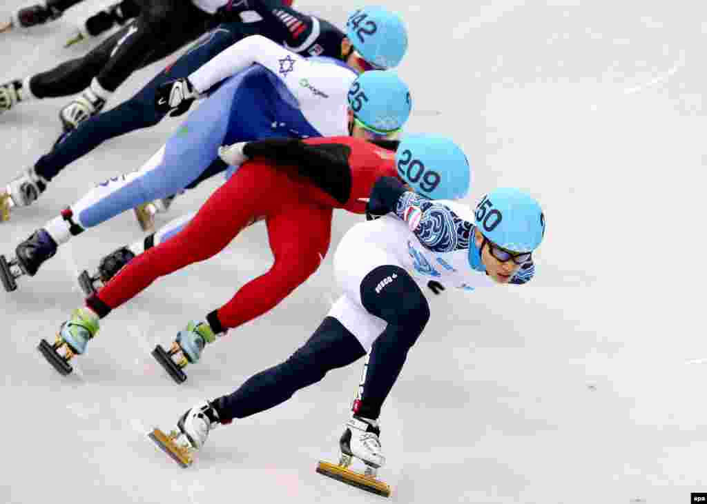 Russia&#39;s Viktor Ahn (right to left) leads Han Tianyu of China, Vladislav Bykanov of Israel, and Park Se-yeong of South Korea during the heat 2 in men&#39;s 1500 meters of the short-track competitions in the Iceberg Skating Palace. Ahn won bronze.