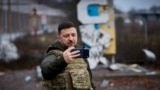 Ukraine's President Zelenskyy appears in the frontline town of Kupyansk on December 12.