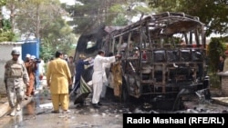 Wreckage of a student bus attacked in Quetta. At least 11 of the women aboard the bus were killed and some 20 others wounded.