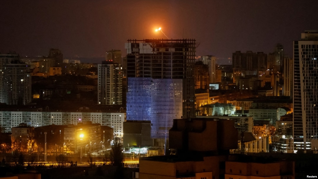 An explosion is seen in the sky over Kyiv during a Russian drone strike on January 3.