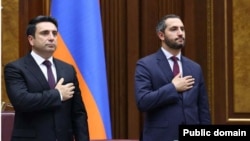 Armenia - Speaker Alen Simonian (left) and his deputy Ruben Rubinian open a session of the National Assembly.